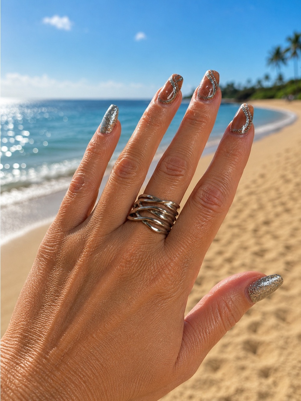 Stainless Steel Adjustable Silver Crisscross Ring in silver or gold tone.